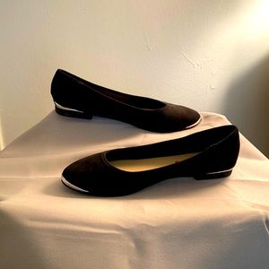Black flats with silver trim